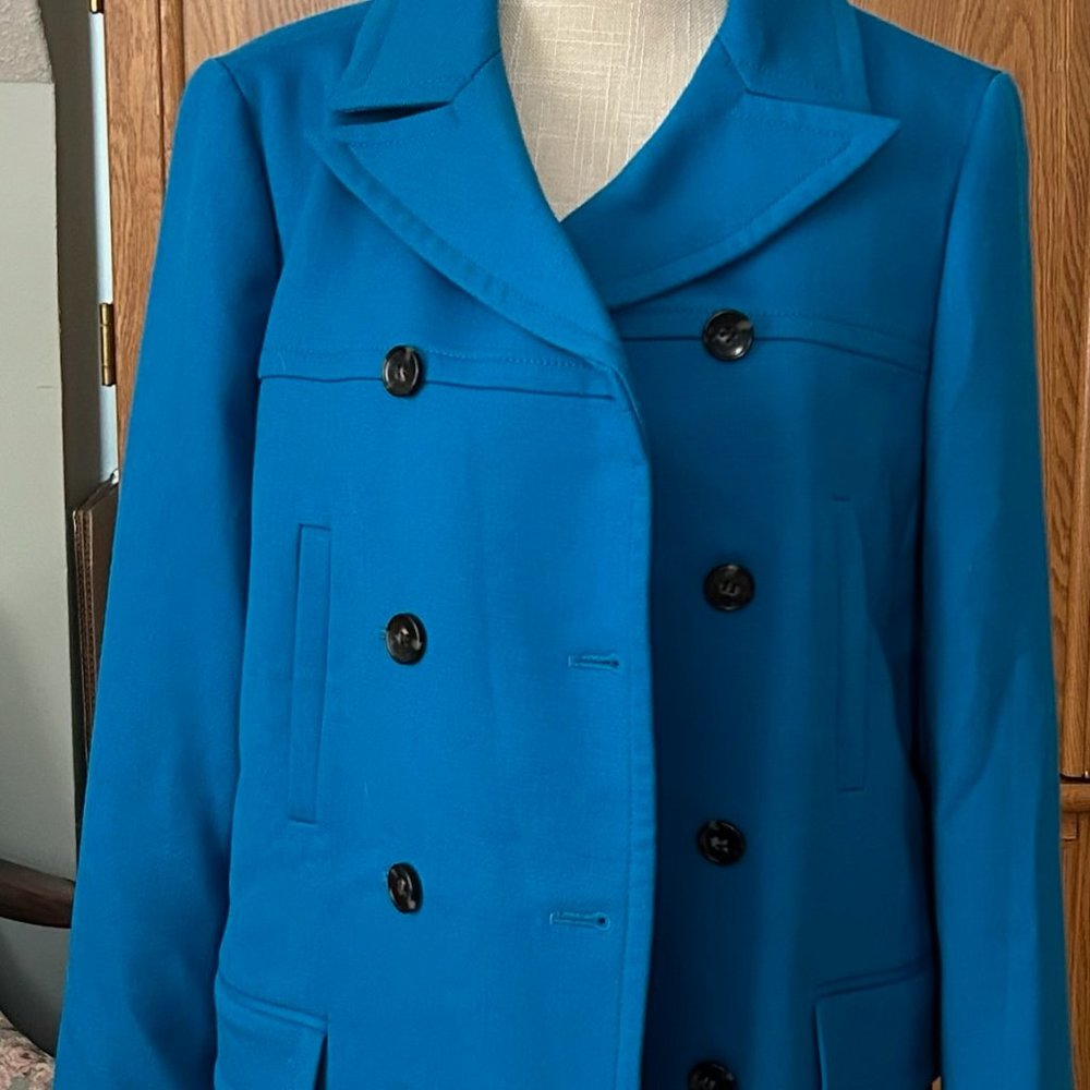 Ann Taylor double breasted coat in pretty blue color.  New.  Knee length.